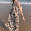 Holiday wind floral v-neck halter suspender dress for women's summer niche loose waist over knee A-shaped long dress wholesale
