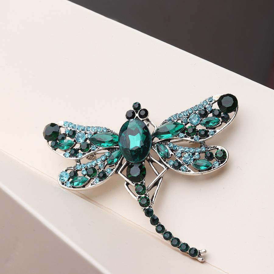 

Брошка Бабка з чорними, синіми, зеленими кристалічними вставками та брошка-метелик з діамантовим акцентом для шовкових шарфів.