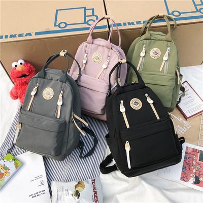backpack with top handle