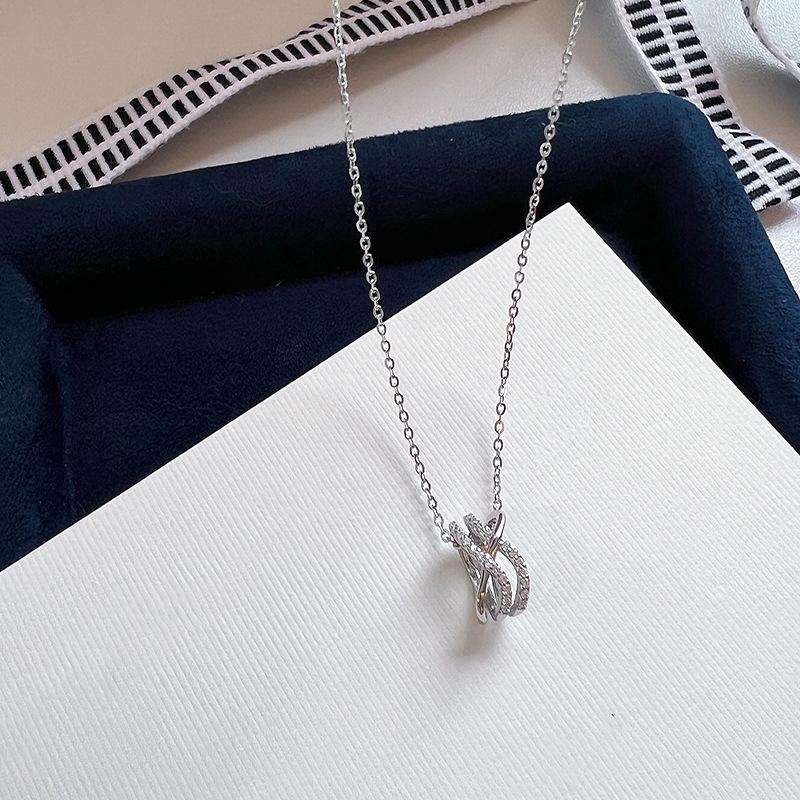 

Ожерелье в виде спирального геометрического креста, женское, легкое, роскошное, нишевого дизайна, с бриллиантами, изогнутая цепочка на ключицу, цепочка на шею из нержавеющей стали