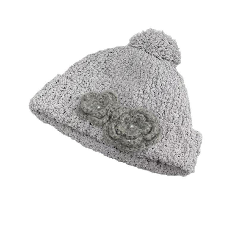 Korean atmosphere soft waxy coarse wool hat autumn and winter new crochet three-dimensional camellia knitted hat niche ear protection hat