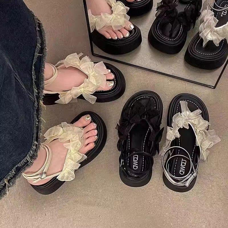 Nischsandaler dam ytterkläder 2025 nya ins superfé rosett tjocksulade fé vind mjuk sula gå ut romerska skor