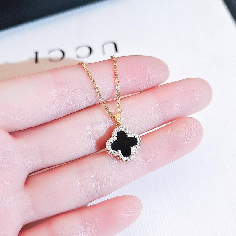 Titanium Steel Double-Sided Four-Leaf Clover Necklace Women'S High-Value Trend Micro-Inlaid Zircon Pendant, A Two-Wear Accessory
