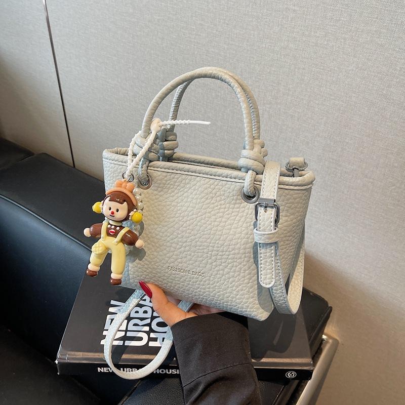 Fashion high-end hand bucket bag spring and summer simple and versatile shoulder bag trendy niche messenger bag