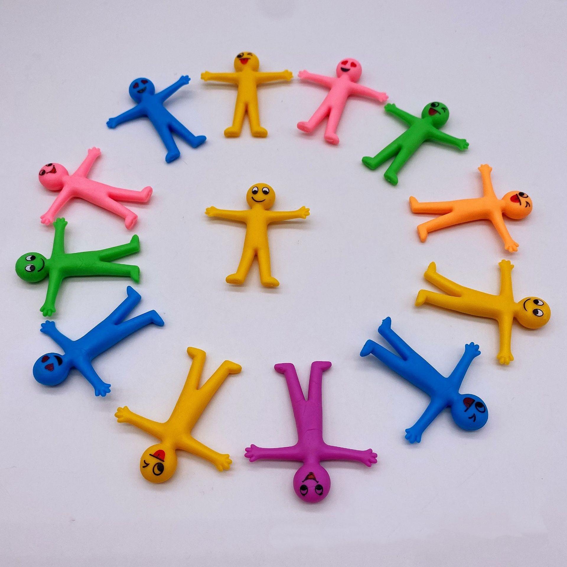 Fashnics Lilac/Yellow/Blue Smiling Expression Stress Relieving Doll Tpr Soft Rubber Villain Stress Relieving Toy Foldable And Stretchable Stress Relieving