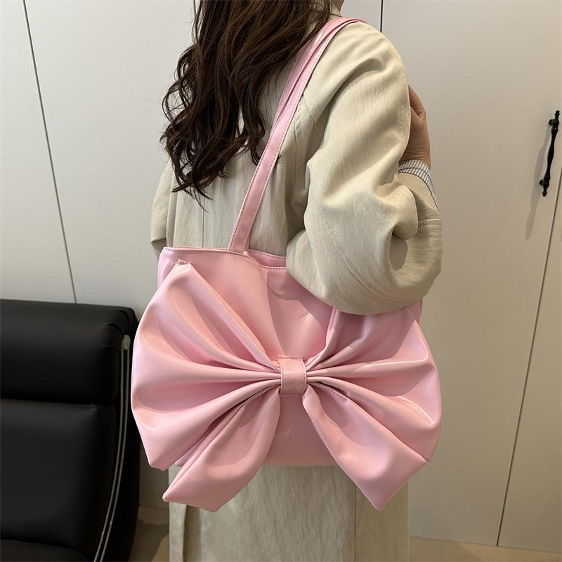 Niche fashion foreign shoulder bag 2025 summer new Korean version girl bow commuter tote bag