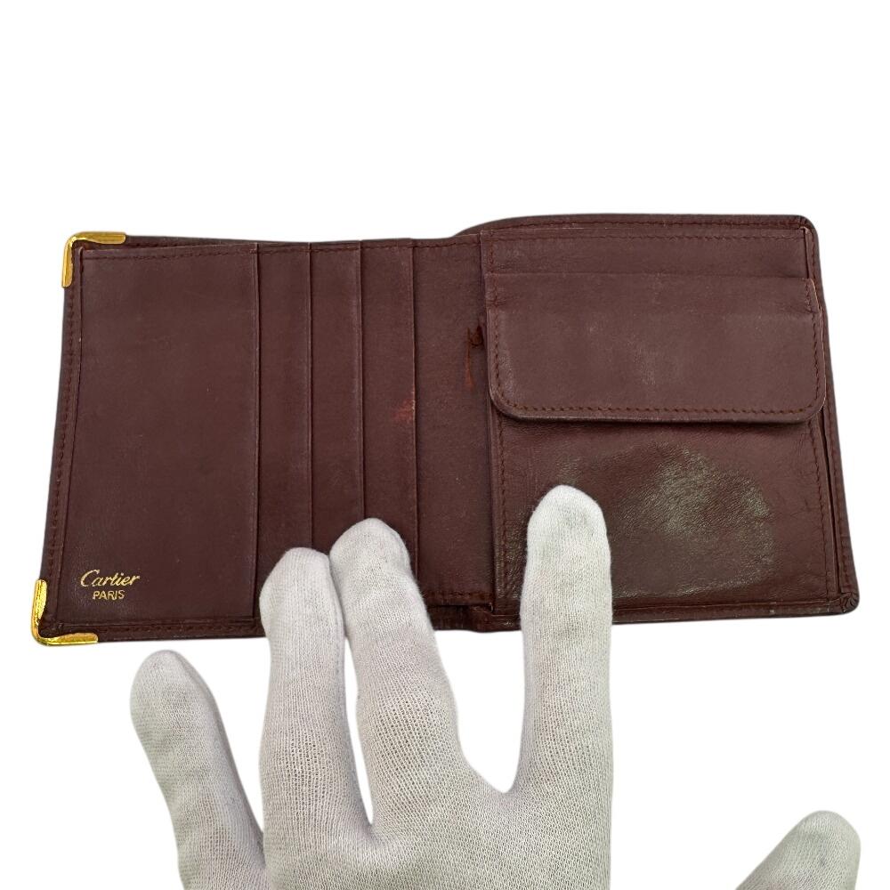 Cartier Ražené logo kožená peněženka Must Line Bifold Červená kůže Dámská Použitá
