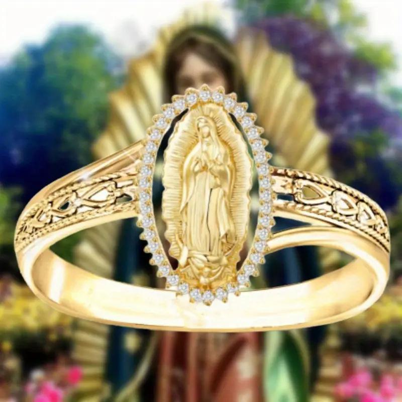 

Elegant oval-shaped gold ring with diamonds surrounding the image of the Virgin Mary, versatile and elegant 6