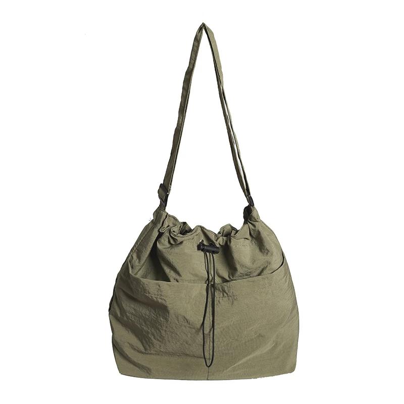 Vysoce kvalitní velkokapacitní nylonová taška na zip jednobarevná všestranná módní měkká jednoduchá taška přes rameno