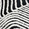 Tapis salon effet relief motifs montagnes blanc noir 120x170
