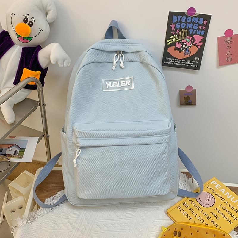 Student backpack Women's new large-capacity outdoor lightweight schoolbag Middle school student candy-colored backpack