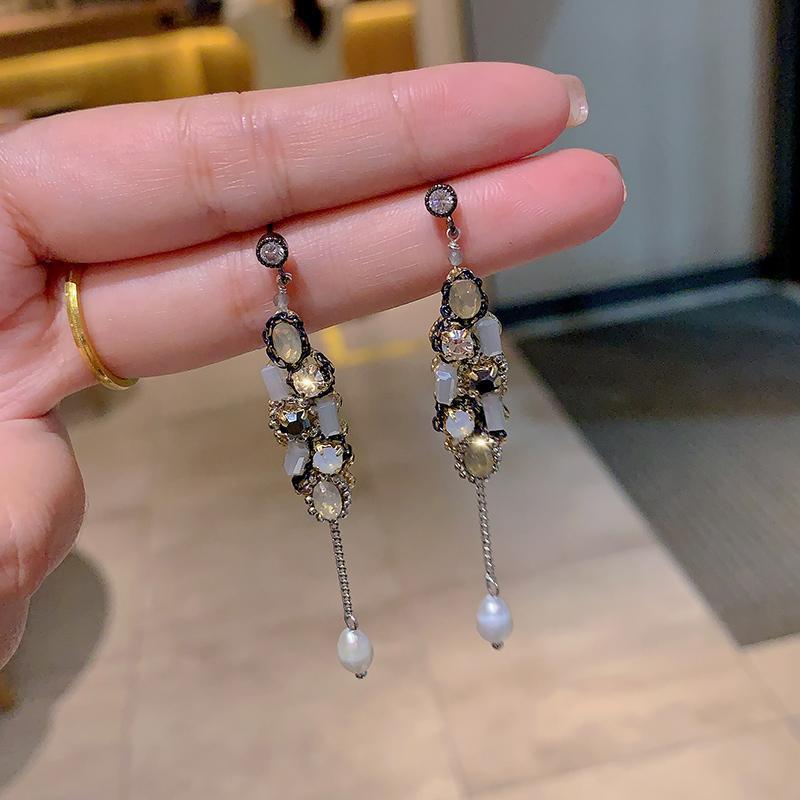 

Natural pearl temperament light luxury fringed earrings women s niche versatile fashion high sense s925 earrings