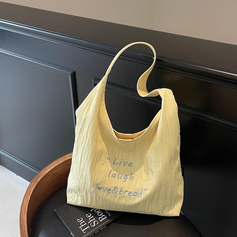 

Embroidered Pleat Canvas Bag Women Summer Large Capacity Class Commuter Bag Niche All-Match Shoulder Underarm Tote Bag Yellow