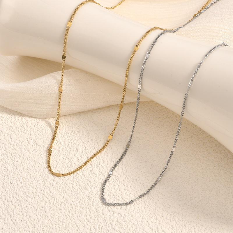 18K Gold-Plated S925 Sterling Silver Necklace for Women - Minimalist Layered Clavicle Chain with Sparkling Flakes, High-End Luxury Design.