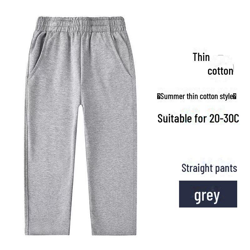 Tmavě modré školní sportovní kalhoty z čisté bavlny pro žáky prvního stupně - chlapci a dívky, volný střih, letní kalhoty.