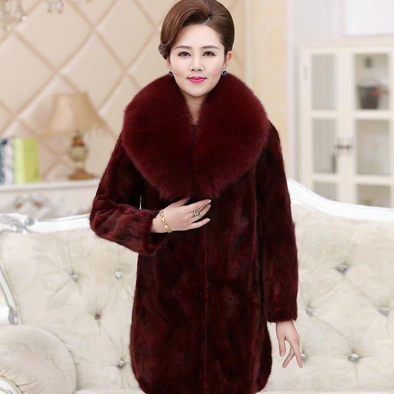 Cappotto da donna invernale di media lunghezza spesso di grandi dimensioni con collo in pelliccia sottile in pelliccia di visone