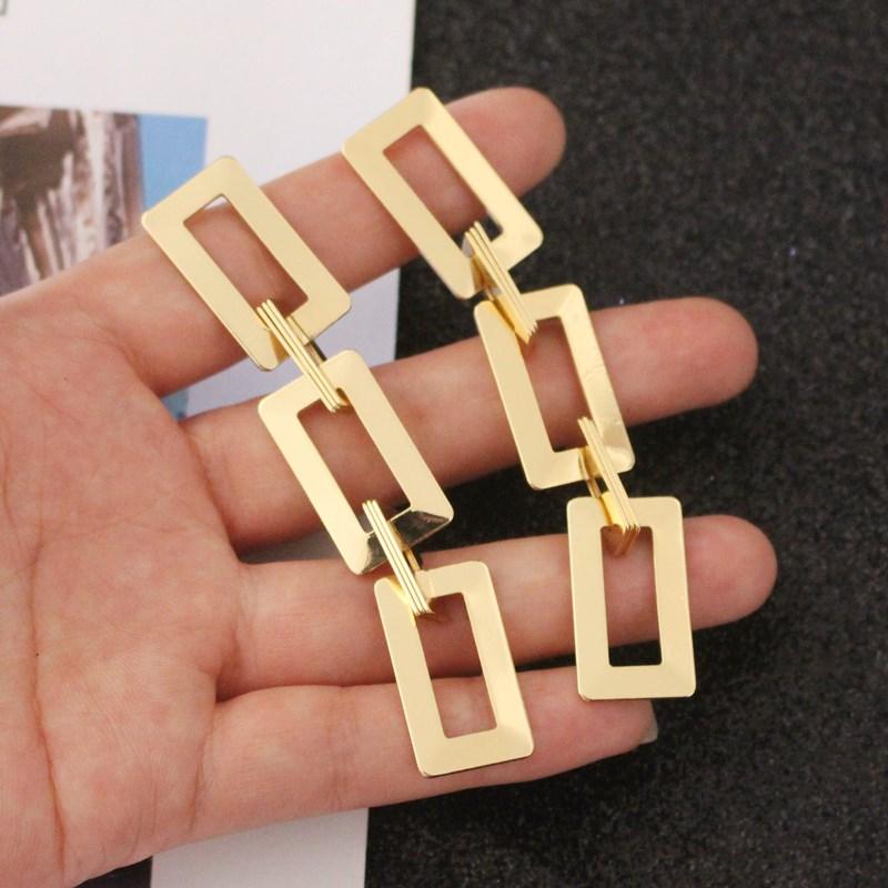 Przesadna geometria Nieregularne metalowe wiszące kolczyki Spiralny skręcony węzeł Okrągłe gładkie Brincos Cyrkonia