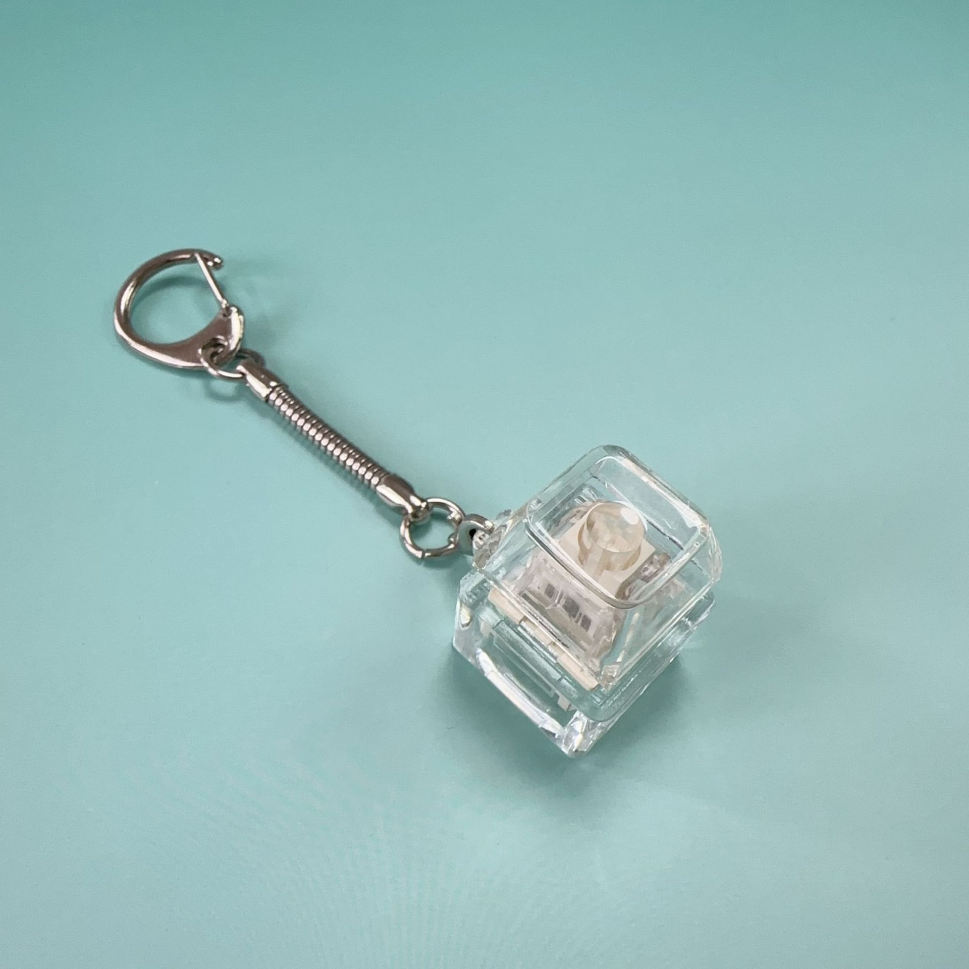 

Decompression 9-hole soft tone keyboard keys 9-key decompression keys toy decompression artifact finger pinching keychain No light (snake bone chain)