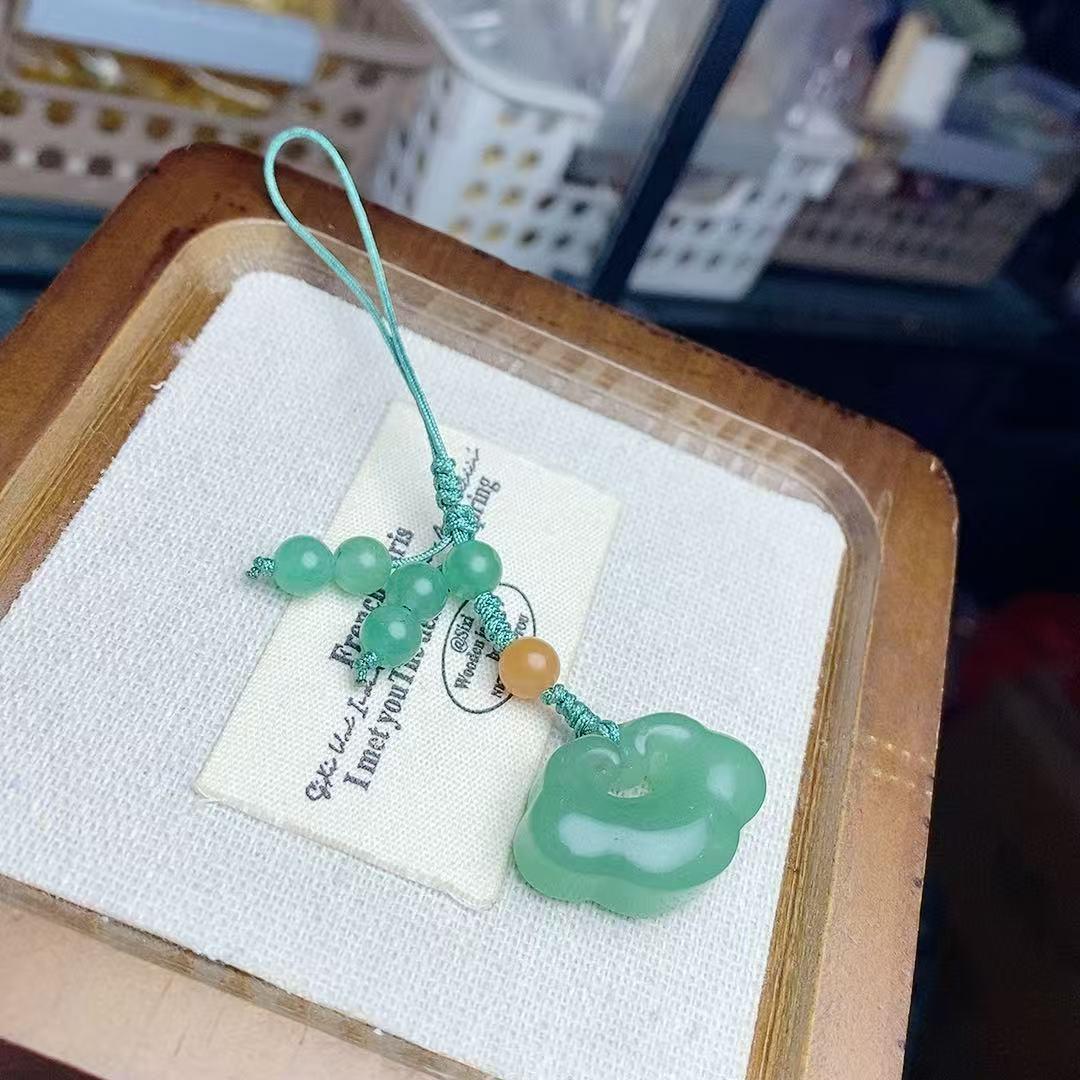 

Jade Auspicious Clouds Phone Charm: Stylish, Simple, Elegant Pendant for Men & Women