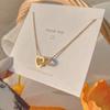 18k Gold-Plated Titanium Heart Double Ring Necklace - Minimalist & Versatile Design for Women