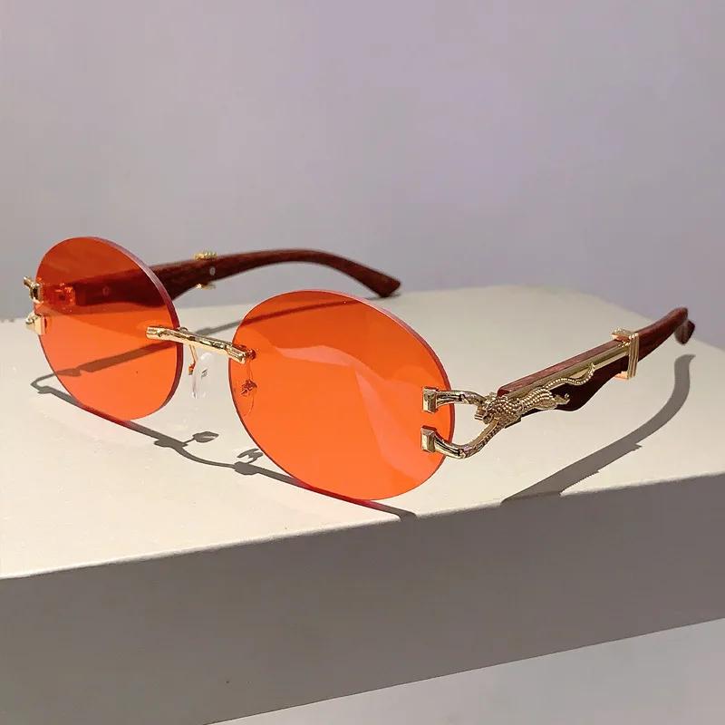 

New Luxury Brand Designer Vintage Rimless Oval Sunglasses Women For Men Sun Glasses Trendy Punk Popular Metal Leopard Eyeglasses