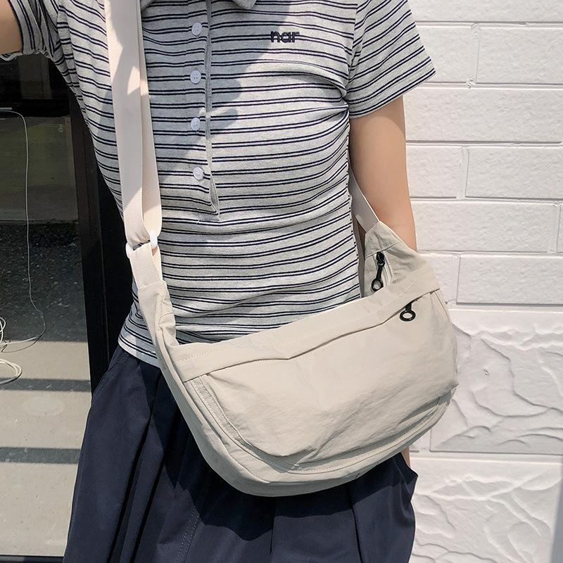 Casual crossbody bag girls lightweight shoulder canvas bag waterproof commuting solid color versatile nylon dumpling bag for men