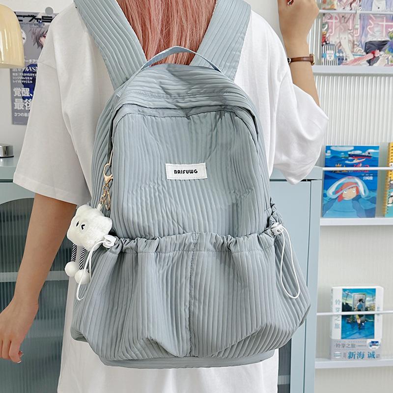 Korean version of casual literary canvas schoolbag ins pleated nylon drawstring ultra-light simple versatile casual backpack