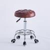 Multi functional hair cutting stool - an ergonomically adjustable height swivel chair suitable for piano rooms, beauty salons