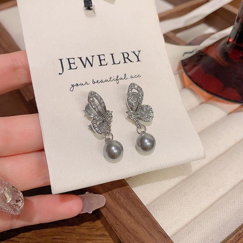 925 Silbernadel Schmetterling Graue Perlenohrringe Damen Nischendesign Ohrringe Leichter Luxus Temperament Neue Ohrringe