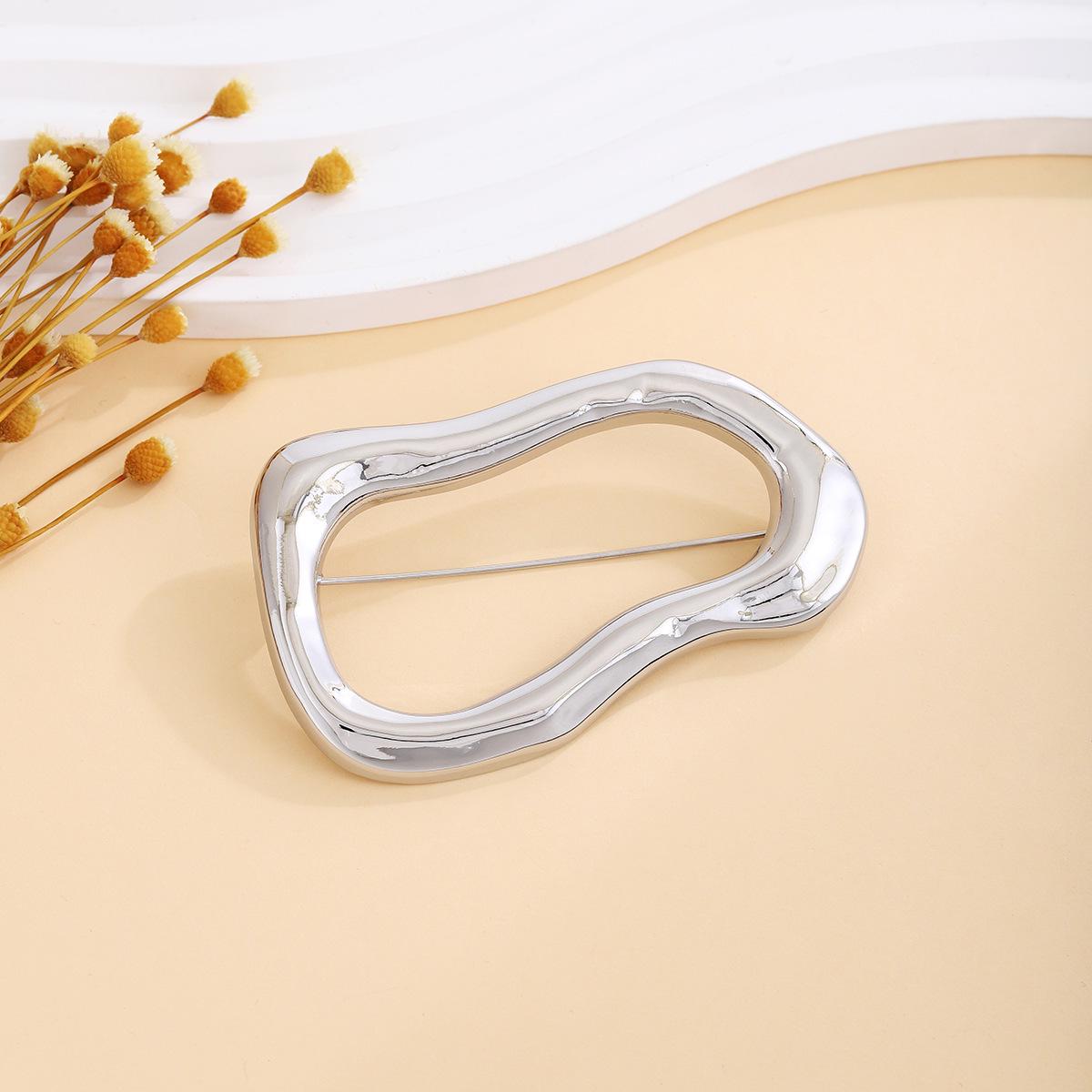 

Элегантная овальная брошь неправильной формы: Минималистичная легкая роскошь для осенне-зимней женской моды