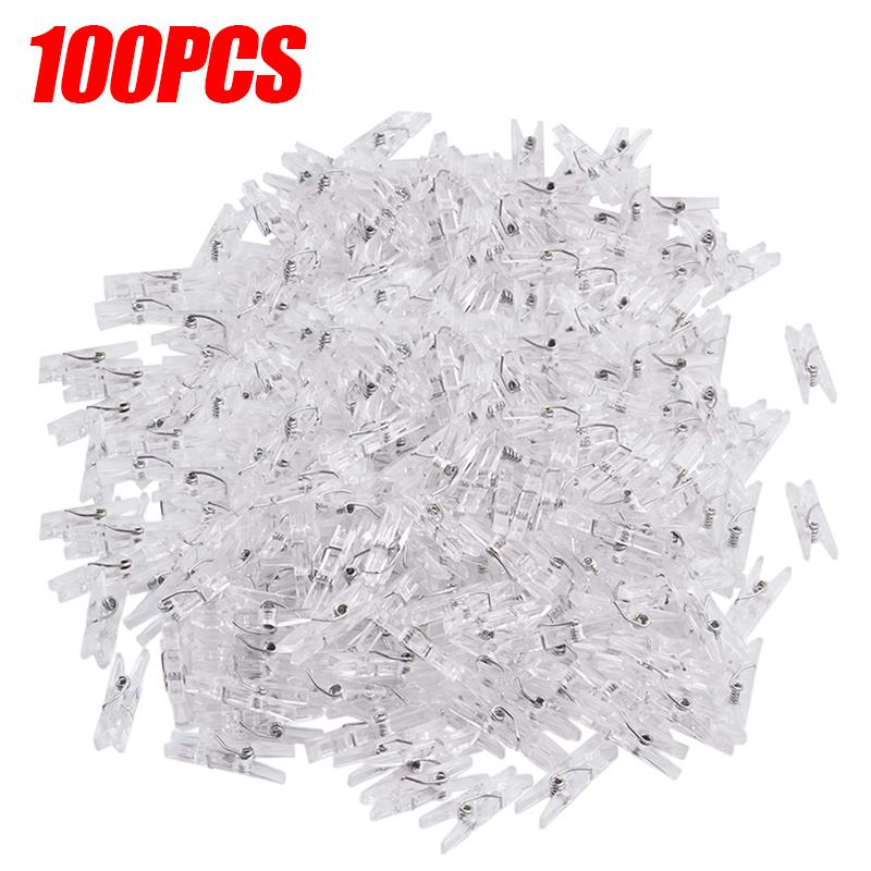 

100/50 ШТ. Пластикові міні-затискачі для фотографій Прозорі пружинні підвісні затискачі для затискачів для DIY весільної вечірки Настінні прикраси будинку Фотозатискачі