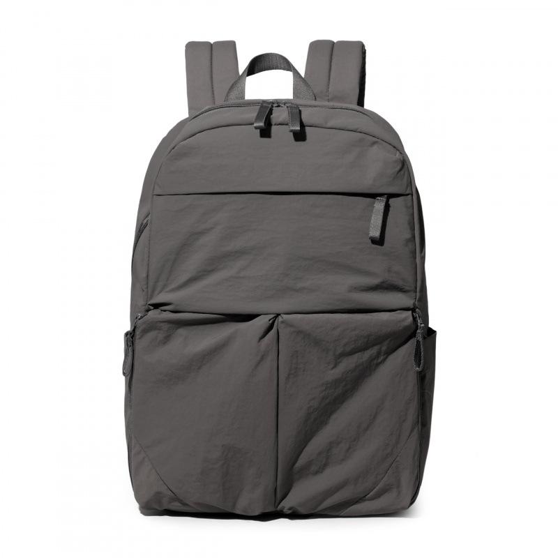 Schoolbag lightweight backpack men and women 1011 new large-capacity leisure travel commuter backpack versatile college student schoolbag tide