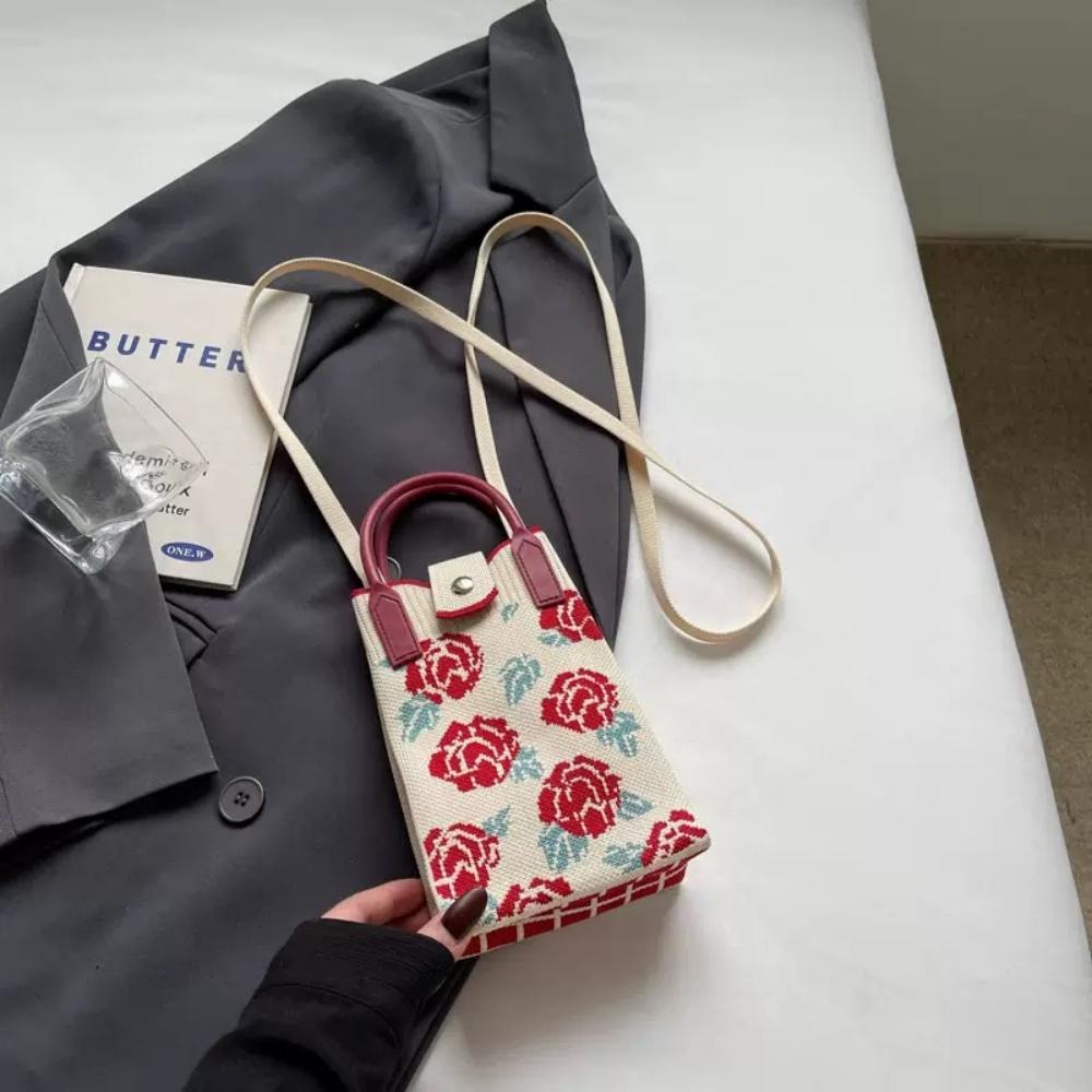 A Spacious Knitted Small Mobile Wallet with a Crossbody Strap, Suitable for Women Traveling with Small Items