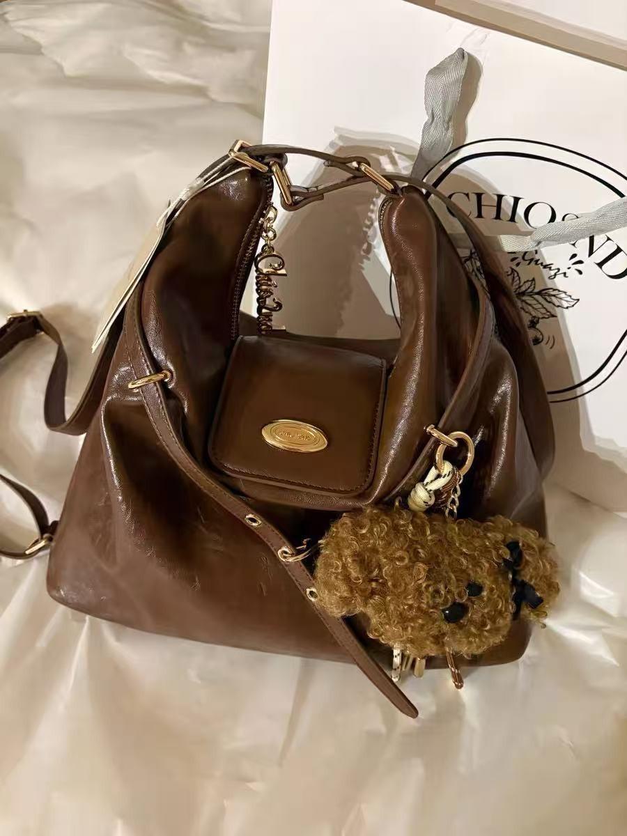 

Nanjia fashion trendy pictorial girl pillow bag this year is popular this year s popular bag women s handbag shoulder armpit bag