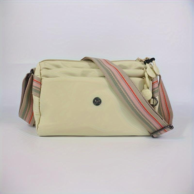 

Женская повседневная сумка-мессенджер из нейлона, водонепроницаемая, с регулируемым ремешком, однотонная, с несколькими карманами, застежка-молния, подкладка из полиэстера бежевый