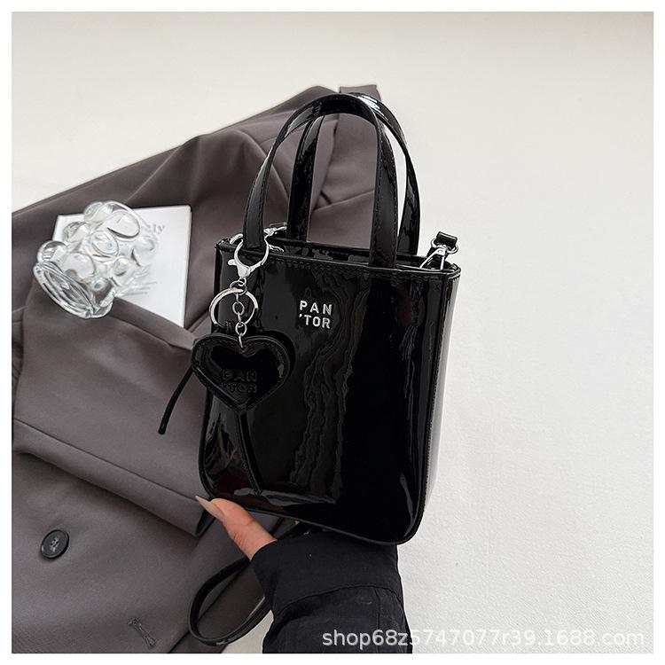 

This year, the popular one-shoulder messenger bag women s 2025 new fashionable portable versatile small square bag exquisite rice mobile phone bag