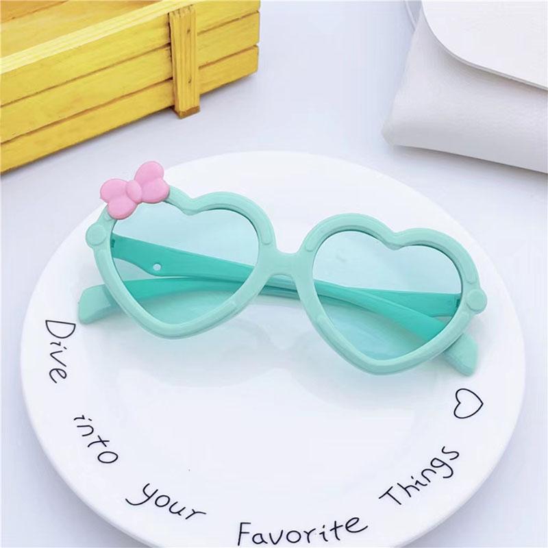 Neue Kinder-Sonnenbrille in Herzform Mädchen-Dekorative Schleife Sonnenbrille Niedliche Baby-Outdoor-Sonnenblende Brillen UV400