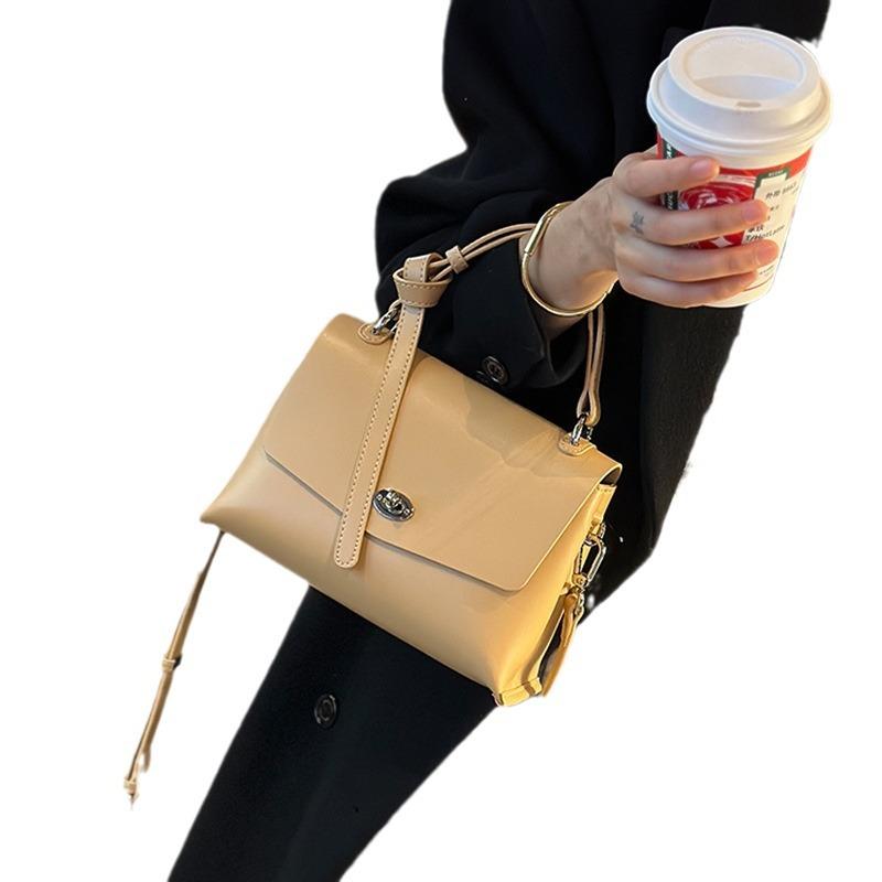 The First Layer of Cowhide Lock Handbag Spring/summer Superior Sense All-in-one Shoulder Bag Commuter Diagonal Bag Women's Bag