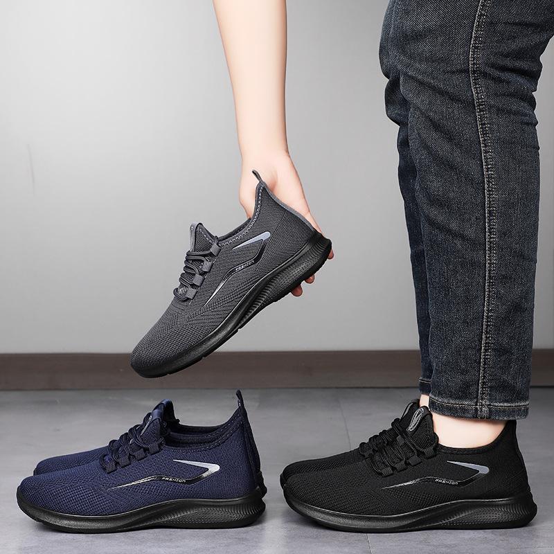 Skor herrskor mångsidiga nya sportiga andningsbara fritidsskor fly-vävda mjukt-sula luktfria fotgående skor