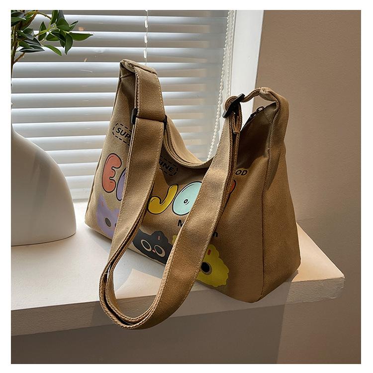Canvas Bag Women's Large-capacity Bag New Fashion Cartoon Letter Casual Shoulder Messenger Bag