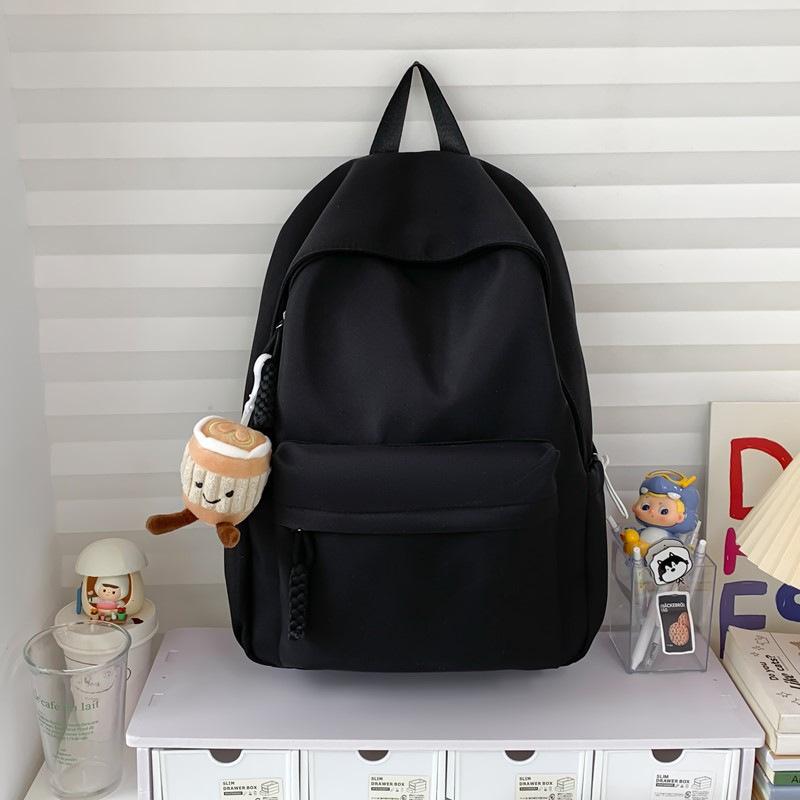 Schoolbag simple solid color schoolbag female Japanese large-capacity backpack junior high school student college student lightweight backpack 