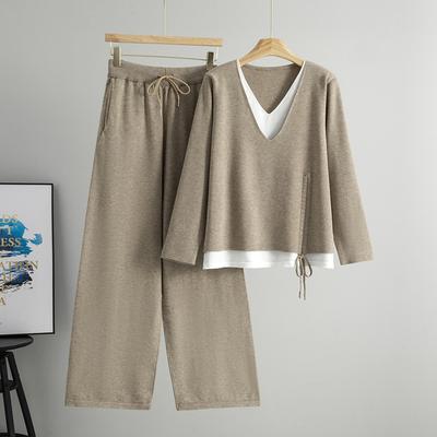 The New Autumn and Winter Fashion Set for Women Features A Drawstring Design At The Hem, A Two-piece Fake V-neck Sweater and Wide-leg Pants