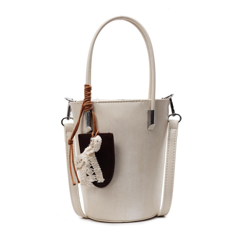 

Уникальная и нишевая ручная сумка-ведро, модная, универсальная и высококлассная женская сумка кроссбоди бежевый