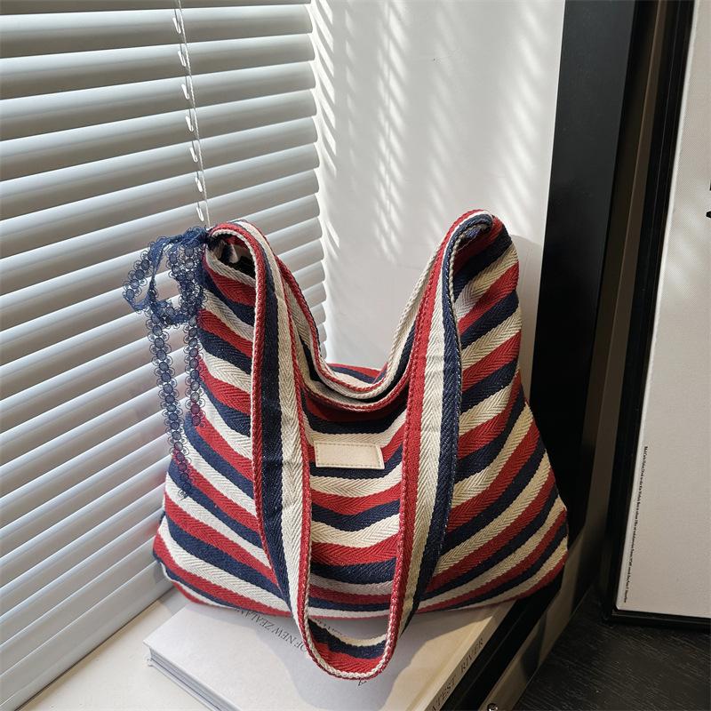 

Новая полосатая тканевая сумка, ленивый литературный стиль, сумка-тоут, студенческая, большой вместимости, повседневная на плечо, подмышечная сумка синий