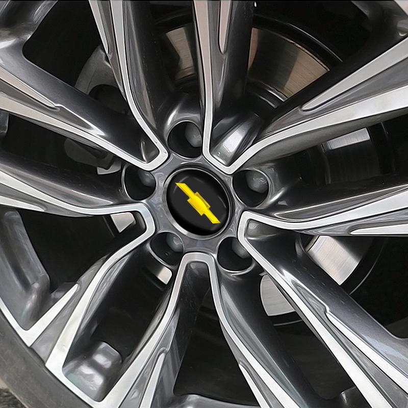 4 szt. 56mm Stop Aluminium Naklejka na Piastę Koła Samochodowego Dla Chevrolet Cruze Malibu Sail Spark Captiva Equinox Trax Tracker AVEO Lova Akcesoria RV
