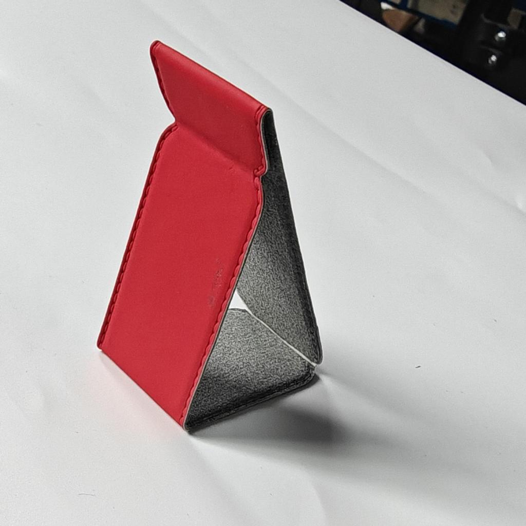 Universal PU Leather Phone Stand: Magnetic, Stick-On Holder for Foldable Android, Apple, and Huawei Devices