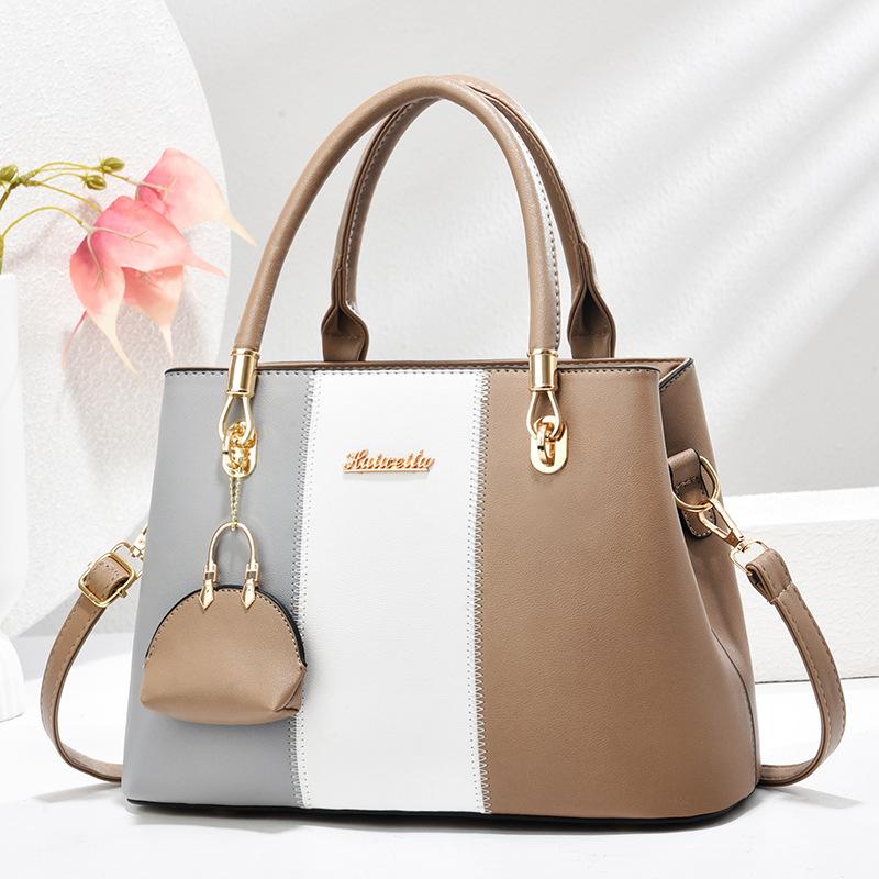 Handbag New bag pendant messenger bag Women's bag