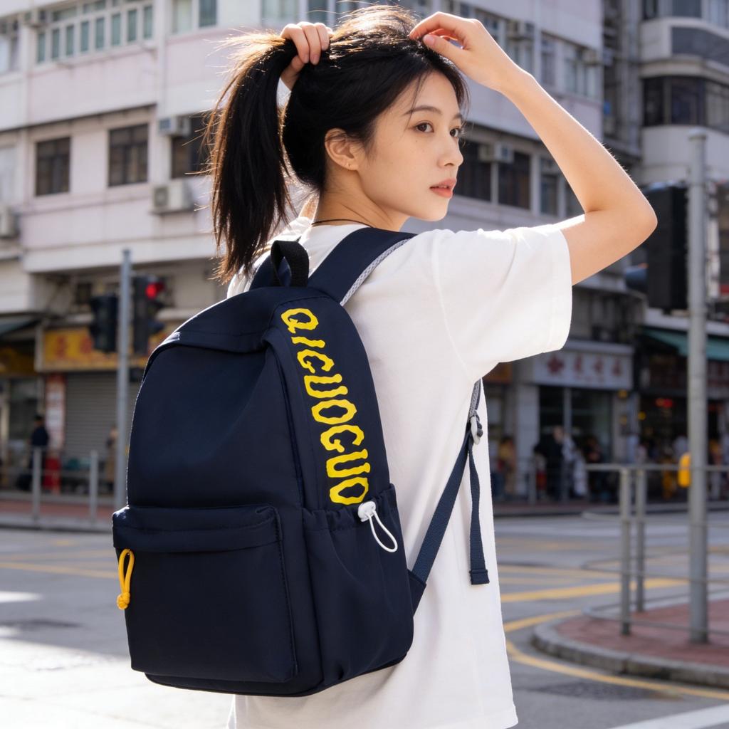 Schoolbag School bag Junior high school boys and girls travel bag Simple and versatile solid color college student backpack High school sports and