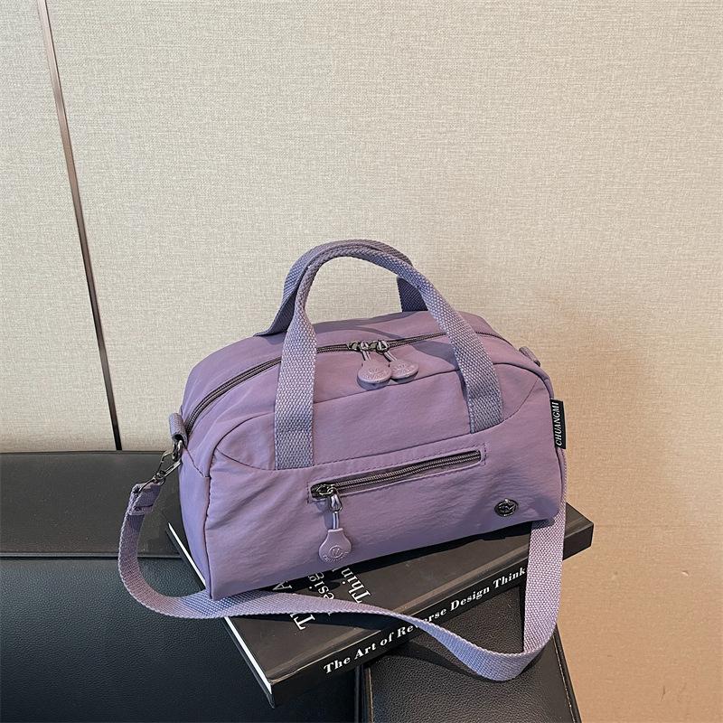 Large capacity lightweight messenger bag girls fashion simple travel bag hand bag shoulder commuter bag фиолетовый
