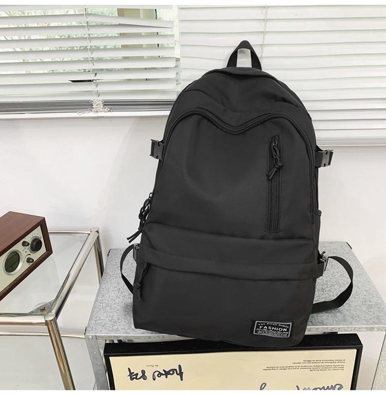 New Korean version of men's and women's large-capacity backpack, junior high school student schoolbag, casual couple college student backpack